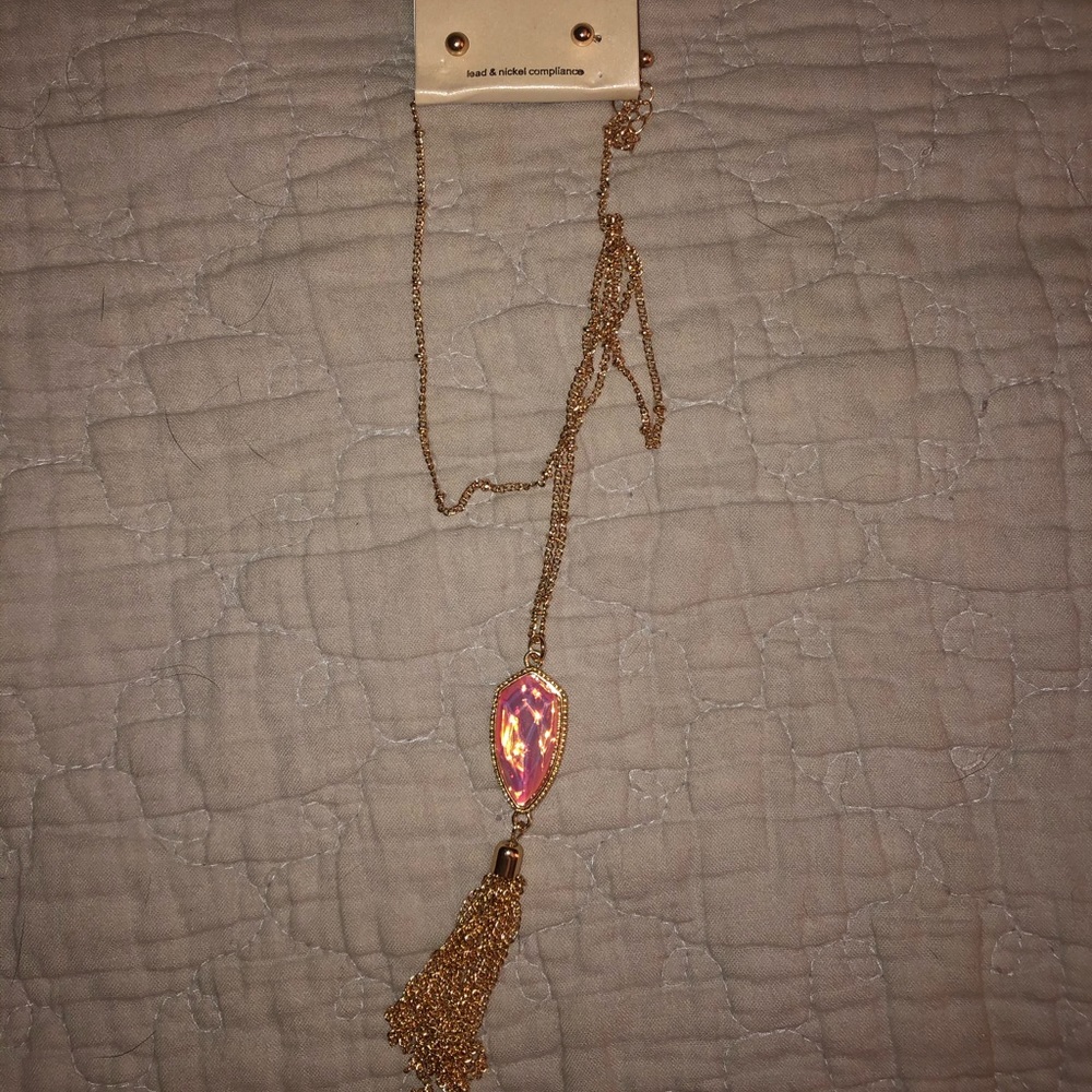 Long necklace with a stone and tassel